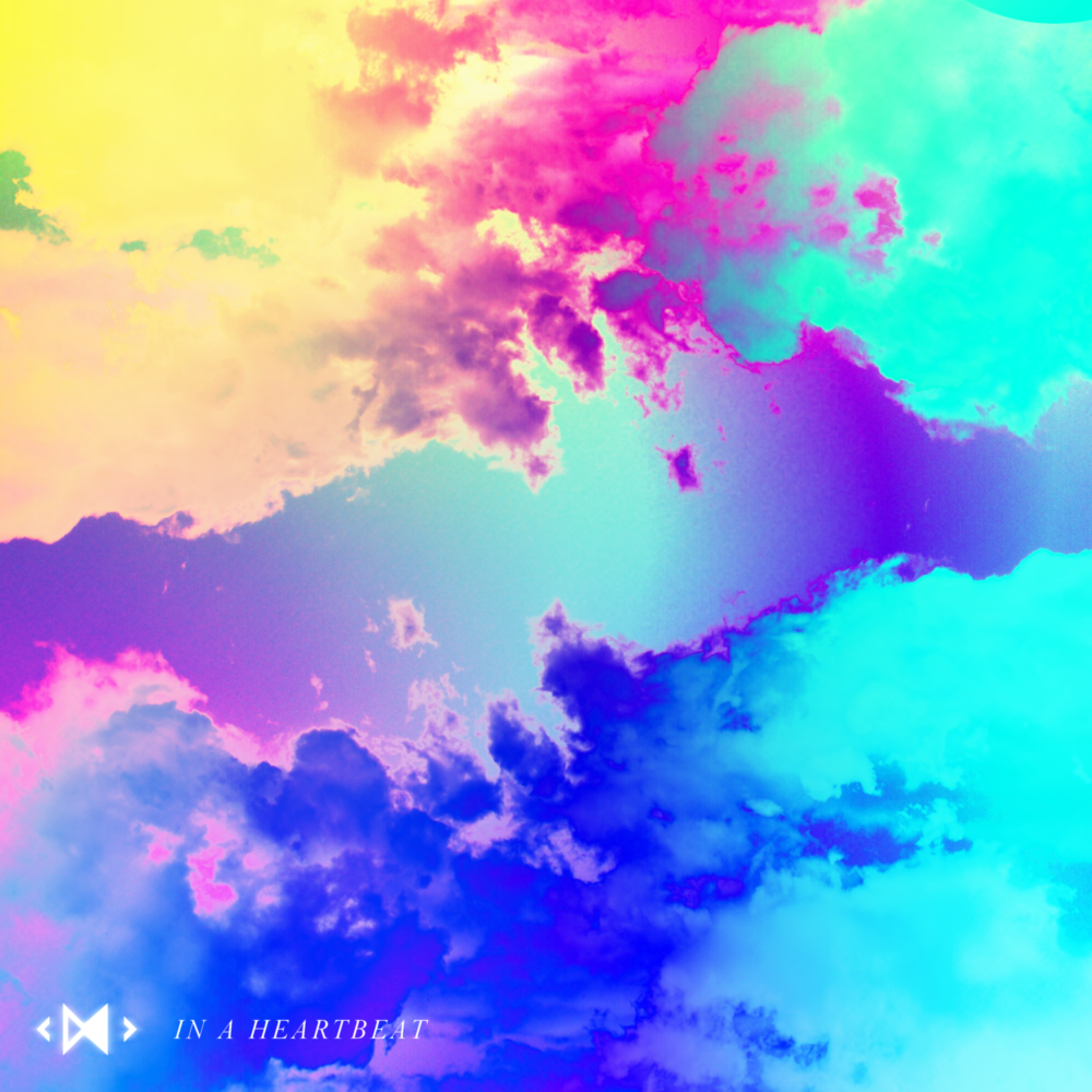 A psychedelic sky with yellow, magenta, cyan, and blue clouds.