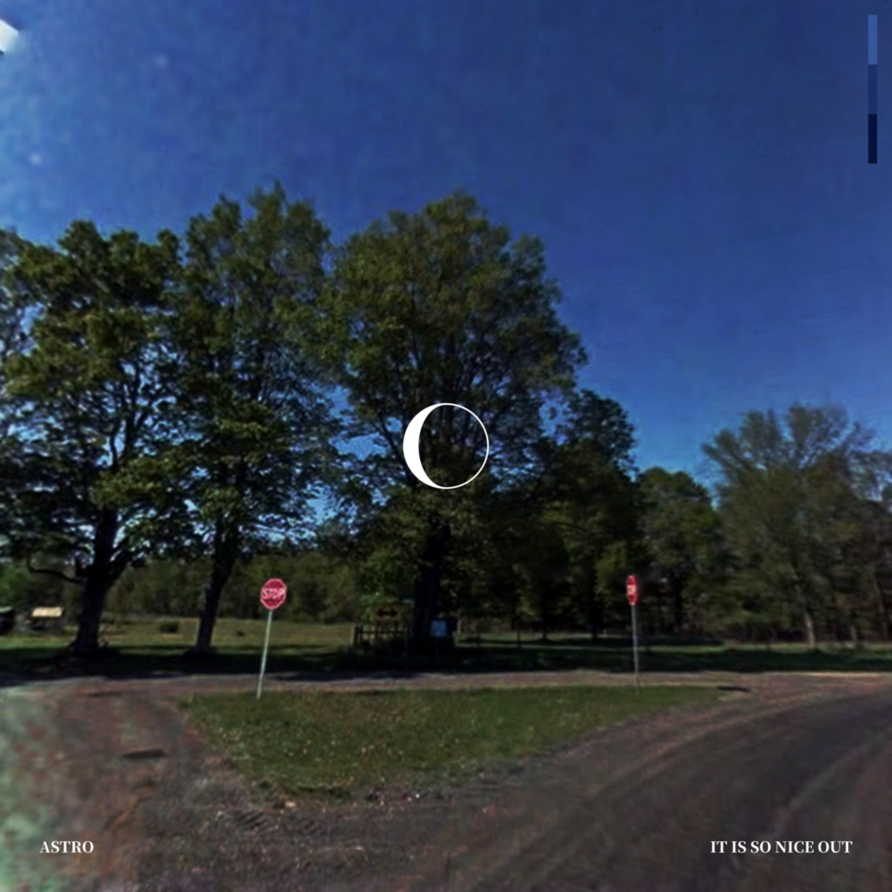 A grainy photograph at a three-way intersection with stop signs in a park. A graphic of a waning crescent moon is in the center.
